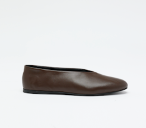 The Proenza Schouler Tee Ballet Flats, crafted in plain brown nappa leather with a black sole, are displayed against a white background.