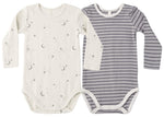 Two Quincy Mae Baby Boys’ Ribbed Bodysuits from the 2-Pack set, one in cream with a moon and star print and the other in gray with white horizontal stripes, laid flat side by side. These organic rib knit bodysuits provide comfort and style for your little one.