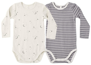 Two Quincy Mae Baby Boys’ Ribbed Bodysuits from the 2-Pack set, one in cream with a moon and star print and the other in gray with white horizontal stripes, laid flat side by side. These organic rib knit bodysuits provide comfort and style for your little one.
