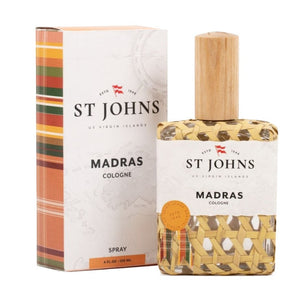 A bottle of St Johns St. Johns Madras Cologne 4 Oz. Spray with a colorful, plaid-patterned label and box. The bottle features a wooden cap and the text "St Johns Madras Cologne" on the front, capturing the essence of fresh mandarins and a hint of black pepper spice.