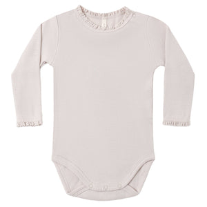 The Quincy Mae Baby Girls’ Waffle Long Sleeve Bodysuit features a light pink hue, ribbed texture, crochet lace ruffle at the neckline and cuffs, and convenient snap closures at the bottom and shoulder.