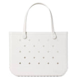 A white, rectangular Original Bogg® Bag tote from Bogg Bags features two handles and evenly spaced holes on the front. The brand name “bogg” is embossed on the lower right corner, making this washable bag a practical choice for your next beach tote.