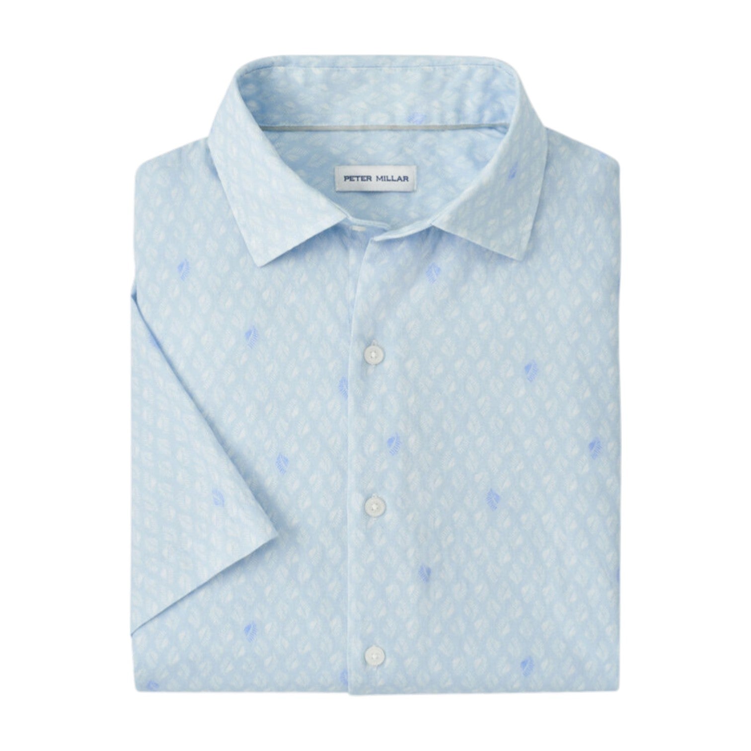The Whitehaven Sport Shirt by Peter Millar is a featherweight, light blue short-sleeve button-up with a subtle white geometric pattern, neatly folded.