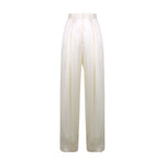The Victoria Beckham Wide Leg Trouser in ivory features a high waist, regular fit, front pleats, and satin-trimmed waistband, shown against a white background.