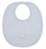 The Giraffe Laughs Bib by Kissy Kissy is a light blue baby mealtime bib made from super-soft Pima cotton, featuring scalloped edges and an embroidered design of two giraffes in the center.