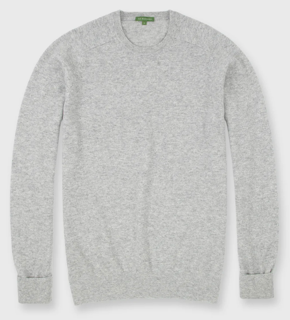 The Sid Mashburn Classic Crewneck Cashmere Sweater in light grey is displayed flat on a white background, featuring long sleeves with ribbed cuffs, collar, and hem.
