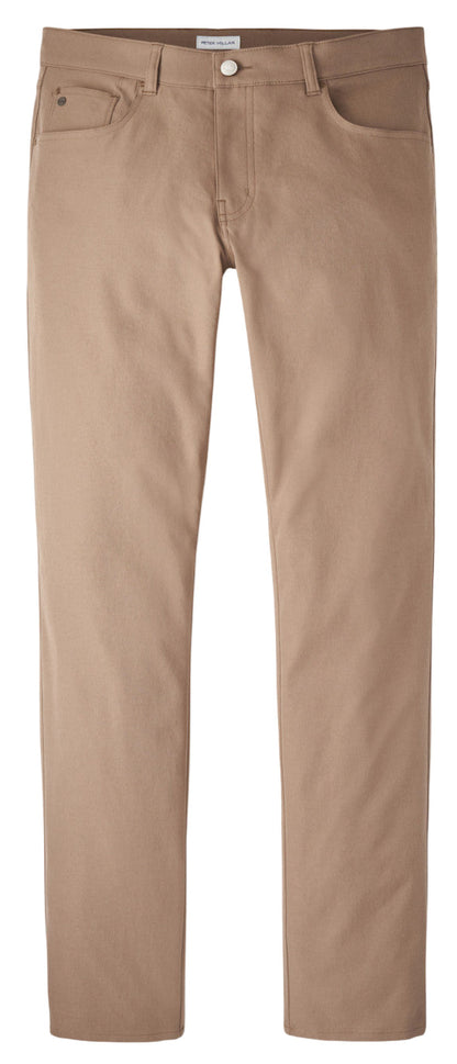 The Peter Millar eb66 Performance Five-Pocket Pant features tan straight-leg jeans made from stretch twill with a comfort waistband, shown against a white background.