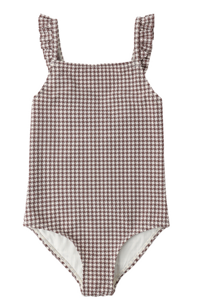 The Girls' Positano One-Piece by Rylee & Cru features a stylish brown and white checkered pattern, ruffled shoulder straps, and a chic square neckline.