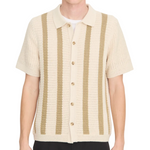 A person wearing the vince Crochet SS Button Down, a short-sleeve shirt with a button-up front and collar, featuring vertical tan stripes on cream knit fabric, shown from the waist up.