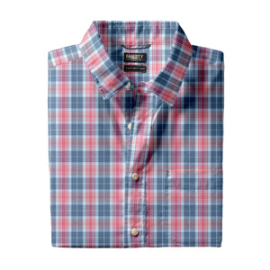 A neatly folded Faherty Movement Monterey Shirt with a blue, red, and white plaid pattern, featuring a collar and chest pocket. This lightweight, comfortable shirt is also wrinkle resistant—perfect for everyday wear.