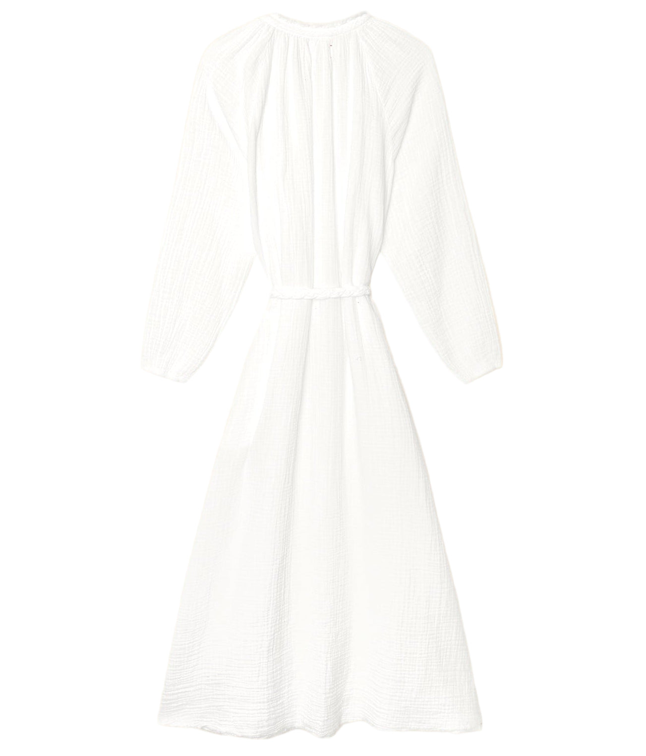 The Andrea Dress by Xirena is a white, ankle-length cotton gauze dress with long sleeves, a textured finish, gathered neckline, and a matching fabric belt at the waist.