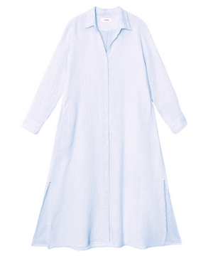 The Boden Gauze Dress by Xirena is a light blue, long-sleeve, button-front shirtdress with a collar and side slits, shown laid flat on a white background.