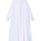 The Xirena Boden Gauze Dress is a long-sleeved, ankle-length, light blue cotton shirtdress with a relaxed fit, shown from the back against a white background.
