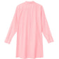 The Xirena Bobby Dress is a long-sleeved, light pink mini shirtdress in crisp cotton poplin, shown from the back with a collar, buttoned cuffs, and a center pleat.