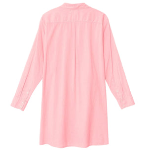 The Xirena Bobby Dress is a long-sleeved, light pink mini shirtdress in crisp cotton poplin, shown from the back with a collar, buttoned cuffs, and a center pleat.