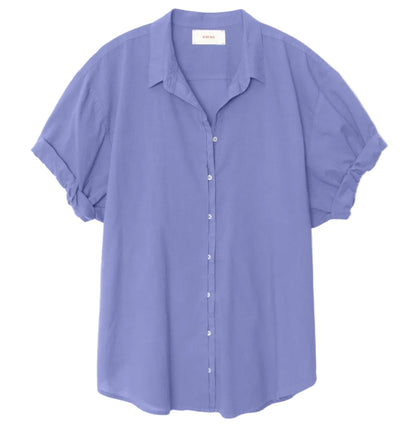 The Channing Cotton Poplin Shirt by Xirena is a short-sleeved, button-up essential in light purple lightweight cotton, shown on a plain white background.