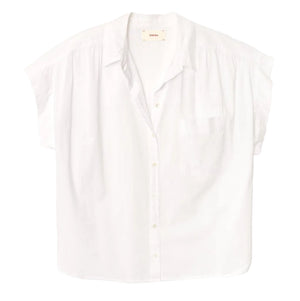 The Lexi Shirt by Xirena is a lightweight cotton, button-front shirt featuring short sleeves, a front chest pocket, spread collar, and a relaxed fit, shown on a plain white background.