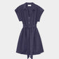 The Eliza Dress by Xirena is a short-sleeve, navy mini shirt dress with a collar, front buttons, and a self-tie waist belt, crafted from soft cotton poplin for effortless style.