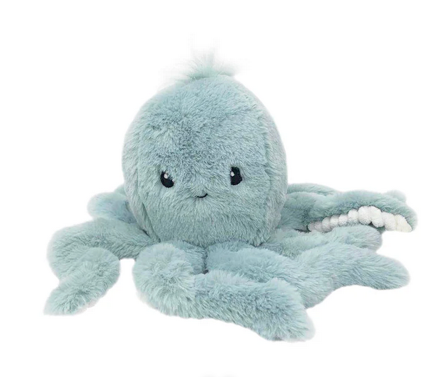 The Oda Octopus Plush Toy by Mon Ami features a light blue, round body, small black eyes, and eight fuzzy tentacles—perfect as a cuddle buddy or a cute baby shower gift. Shown on a white background.