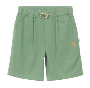 The Boys' Cotton Rustic Bermuda Short by Arsene & Les Pipelettes comes in light green textured cotton, with an elasticated waist and striped drawstring, handy side pockets, and small orange "AP" initials on the left leg.