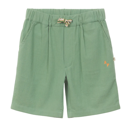 The Boys' Cotton Rustic Bermuda Short by Arsene & Les Pipelettes comes in light green textured cotton, with an elasticated waist and striped drawstring, handy side pockets, and small orange "AP" initials on the left leg.