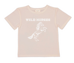 Introducing the Girls’ Tom Wild Horses T-Shirt by Louis Louise: a light beige tee showcasing a white wild horse graphic, topped with “WILD HORSES” in a bold western-inspired font—ideal for adventurous kids and perfect for nature lovers.