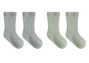 Four identical pairs of Quincy Mae Socks Set in light gray, ribbed crew style are arranged in a row on a white background.