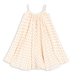 The Girls’ Coco Strap Dress by Konges Slojd is a cream-colored muslin summer dress with thin shoulder straps and a flared silhouette, featuring a soft feel and a small, repeating yellow and pink floral pattern.