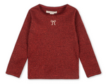 Girls’ Roli Blouse by Konges Slojd, a long-sleeved, glittery red knitted top with a small white bow detail at the neckline.