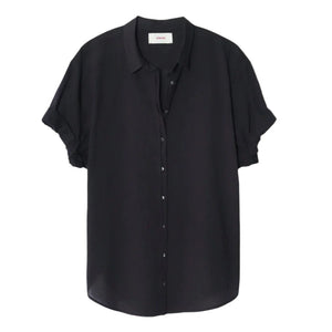 The Xirena Channing Shirt by Xirena is a black, short-sleeve button-up featuring a collar and button-down front, made from lightweight cotton poplin and showcased on a white background.