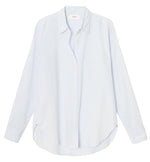 A plain white Xirena Beau Shirt with long sleeves and a pointed collar displayed against a white background.