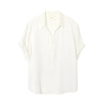 The Xirena Cruz Top by Xirena is a white short-sleeve button-up shirt made from double-faced cotton gauze, featuring a collar in a semi-formal style, and displayed against a plain white background.