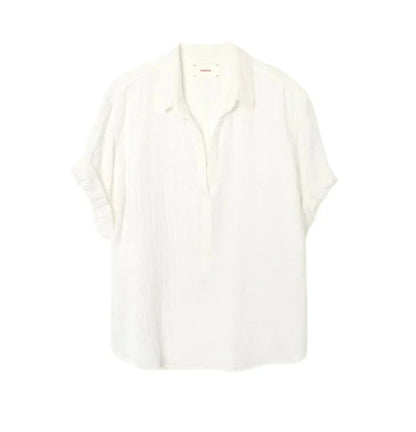 The Xirena Cruz Top by Xirena is a white short-sleeve button-up shirt made from double-faced cotton gauze, featuring a collar in a semi-formal style, and displayed against a plain white background.