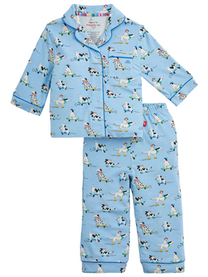 Introducing the Boys’ Ruff Riders PJ Set by Magnetic Me—a two-piece children’s pajama set in blue, adorned with a playful print of cows, dogs, and children. Crafted from soft RightFit fabric that offers optimal comfort and safe, non-toxic flame resistance, this set includes a long-sleeved button-up top and matching pants.