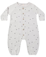 The Quincy Mae Baby Boys’ Waffle Long Sleeve Jumpsuit, shown flat on a white background, features a cozy waffle knit fabric with a subtle small star pattern, front button closure, and elasticized cuffs.