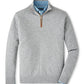 The Peter Millar Artisan Crafted Cashmere Flex Quarter-Zip in light gray features a brown zipper pull and layers easily over a light blue collared shirt for a refined look.
