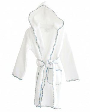 The Terry Tots Kids’ Bathrobe in white is crafted from plush terrycloth and features a blue scalloped floral trim along the edges. This hooded, belted bathrobe includes two front pockets and is shown against a plain white background.
