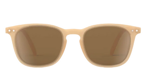 IZIPIZI Kids’ #E Polarized Sunglasses feature a beige frame with brown-tinted polarized lenses, offering a lightweight design and reliable UV protection, shown against a white background.