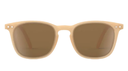 IZIPIZI Kids’ #E Polarized Sunglasses feature a beige frame with brown-tinted polarized lenses, offering a lightweight design and reliable UV protection, shown against a white background.