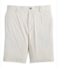 A pair of Johnnie-O Fusionn Shorts in light beige, featuring a knee-length chino style with belt loops and a button closure, laid flat on a white background.