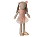 The Maileg MAIL Bunny size 2, Classic, wears a ballet suit and rose skirt with headband and gold shoes. This plush doll stands upright against a plain background.