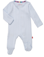 The Magnetic Me Baby Love Lines Pointelle Footie, in light blue organic cotton, features long sleeves and a footed bottom. It boasts subtle vertical stripes with a colorful striped neckline trim, providing comfort and style for your little one.