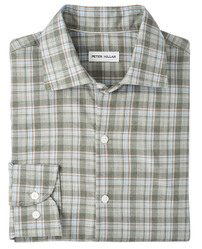 A folded long-sleeve button-up with a green, white, blue, and brown plaid pattern. The Peter Millar Whitecap Performance Flannel Sport Shirt is crafted from lightweight fibers—perfect for fall.