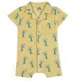 The BTN Lilo Onesie by Bonton is a vibrant yellow short-sleeve romper featuring a blue palm tree print, front buttons, collar, and chest pocket—expertly crafted from soft cotton for all-day comfort.