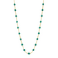 The Gigi Clozeau Classic Gigi Necklace 19.7" features an 18-carat yellow gold chain embellished with delicate small teal beads, offering a perfect touch of elegance.