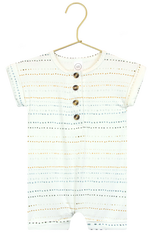 Lou Lou & Company Baby Boys’ Conrad Romper with short sleeves and a button-down front, crafted from white fabric featuring dotted horizontal lines in blue, yellow, and gray, is displayed on a hanger.