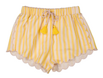 Louis Louise Girls’ Kalea Short in yellow and white stripes, designed with scalloped edges, an elastic waistband, and a drawstring finished with two yellow tassels, shown on a white background.