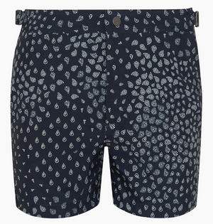 The Onia Calder Buckle 5" Swim Trunk for men in navy blue features quick-drying fabric, an adjustable waistband, and a white geometric drop pattern.