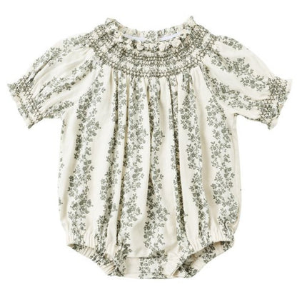 The Rylee & Cru Baby Girls' Ada Romper features short sleeves, a green floral print, a smocked neckline, and elastic leg openings for a cute and comfy style.