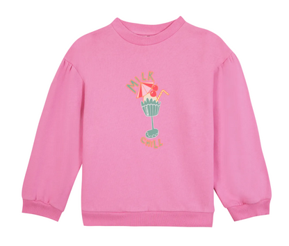 The Bonton Girls’ Nolwen Sweatshirt is a pink long-sleeve top featuring puffy sleeves, a colorful frozen drink graphic, and the words “Milk Chill” on the front.